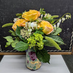 Vintage floral pitcher arrangement