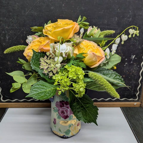 Vintage floral pitcher arrangement