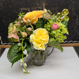 Vintage cut glass pitcher arrangement